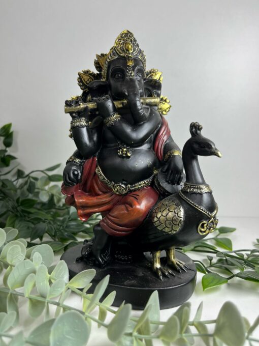 Ganesha pavo real y flauta