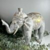 Elefante tallado en madera oro blanco